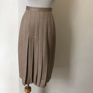 Front pleat office pencil skirt in a light camel brown herringbone